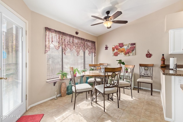 dining room featuring light tile patterned floors and ceiling fan