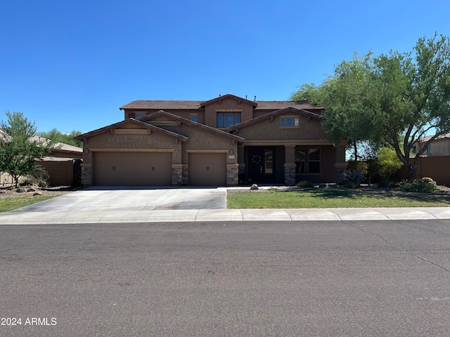 craftsman-style home with a garage