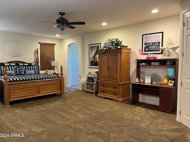 carpeted bedroom featuring ceiling fan