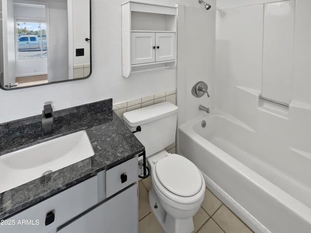 full bathroom with vanity, shower / bathing tub combination, tile patterned floors, and toilet