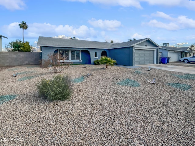 single story home featuring a garage