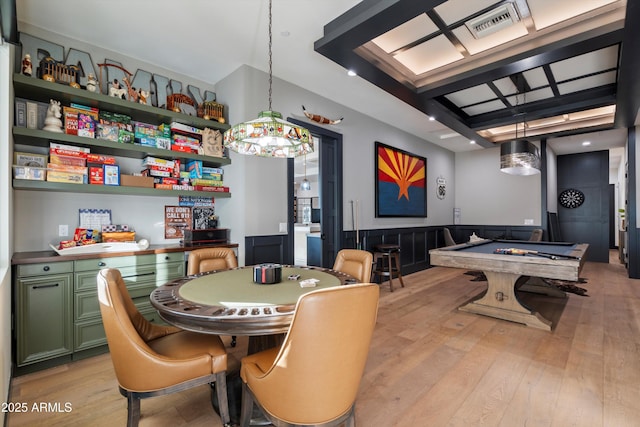 game room with light wood-style floors, visible vents, pool table, and wainscoting