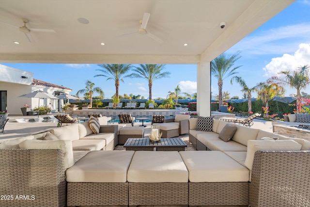 view of patio featuring a ceiling fan and an outdoor hangout area