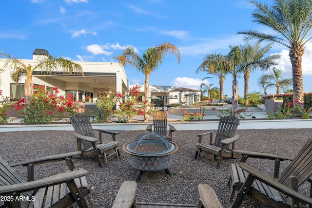 view of patio with an outdoor fire pit