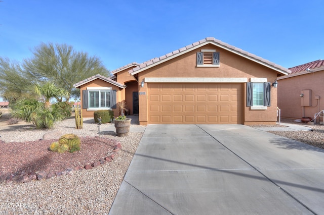 ranch-style home featuring a garage