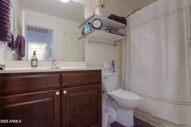 bathroom featuring vanity, a shower with curtain, and toilet