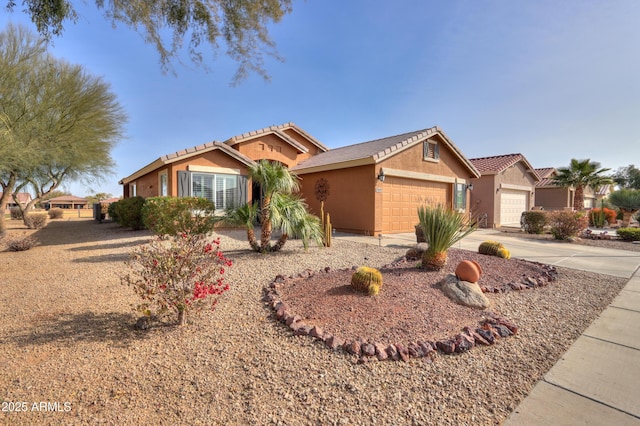 single story home featuring a garage