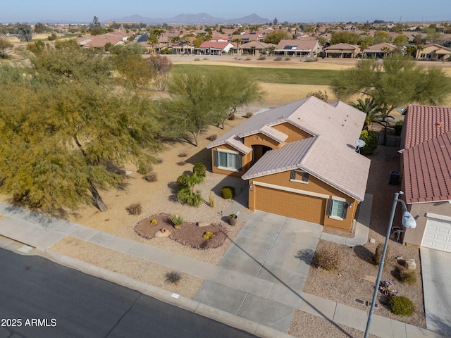 birds eye view of property featuring a mountain view