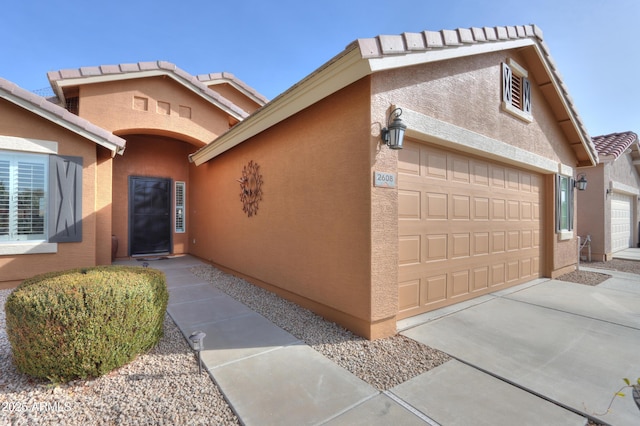 view of front of home with a garage