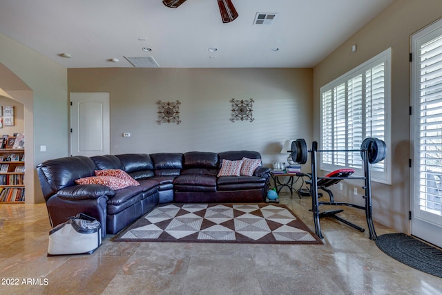 living room featuring plenty of natural light