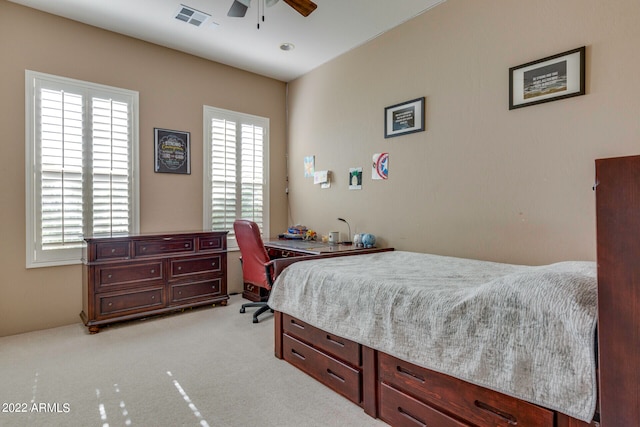 carpeted bedroom with ceiling fan