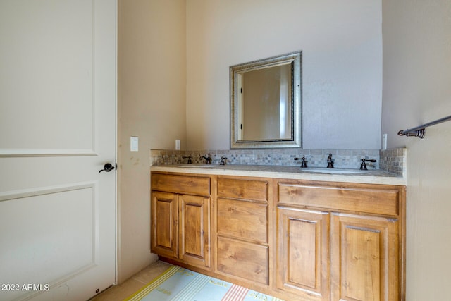 bathroom featuring dual bowl vanity