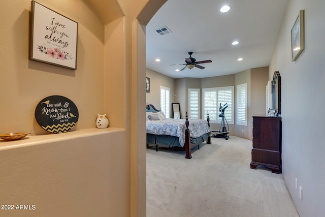 carpeted bedroom with ceiling fan