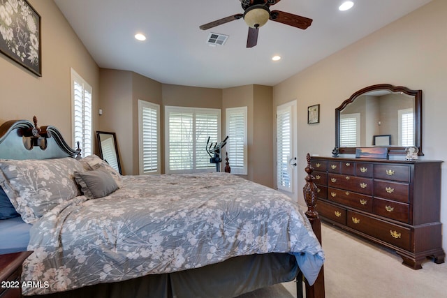 carpeted bedroom with ceiling fan