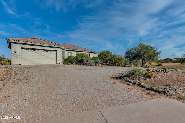 view of front of home featuring a garage