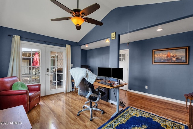office area featuring ceiling fan, high vaulted ceiling, french doors, baseboards, and wood finished floors