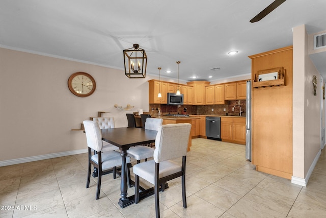 dining space with crown molding, ceiling fan with notable chandelier, recessed lighting, baseboards, and visible vents