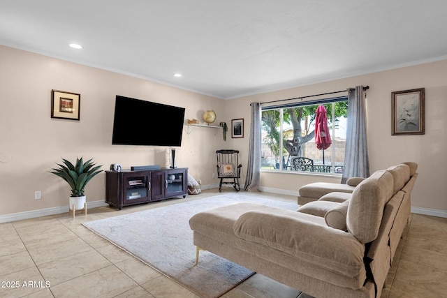 living room featuring crown molding, baseboards, and recessed lighting