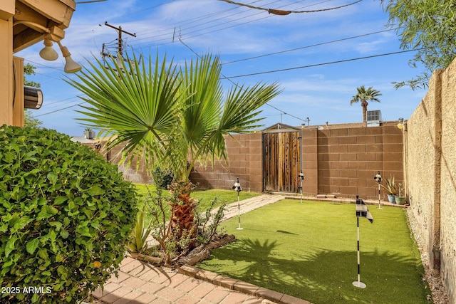 view of yard featuring a gate and fence