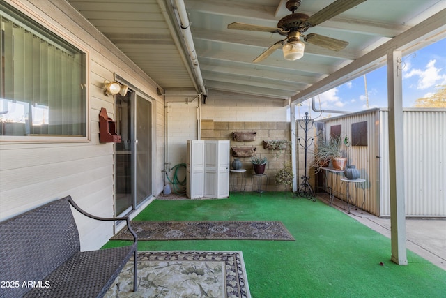 view of patio featuring ceiling fan