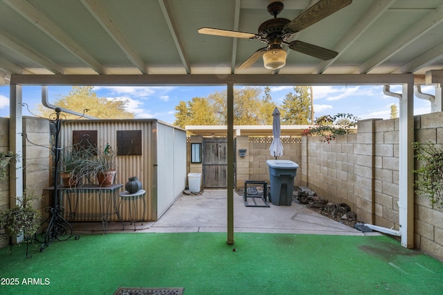 view of patio / terrace featuring ceiling fan