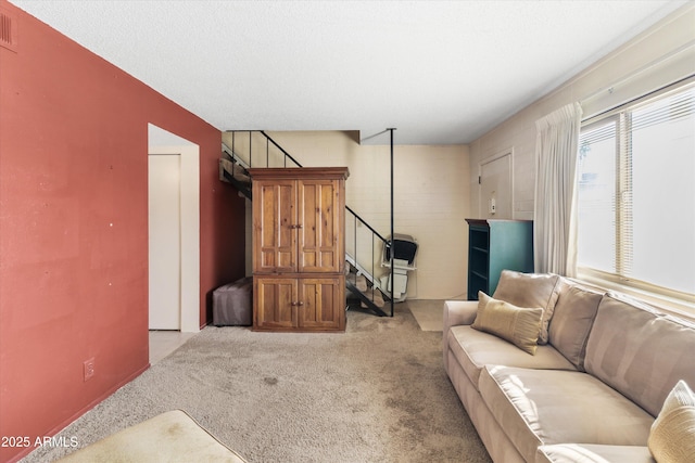 living room featuring light colored carpet