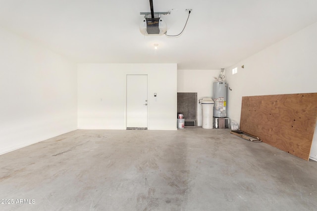 garage featuring gas water heater and a garage door opener