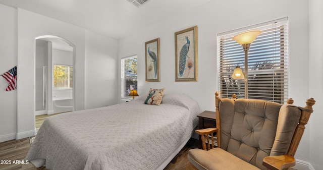 bedroom featuring hardwood / wood-style floors