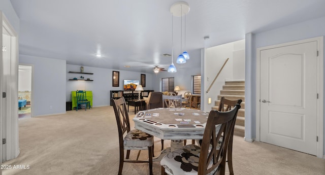 dining area with light carpet