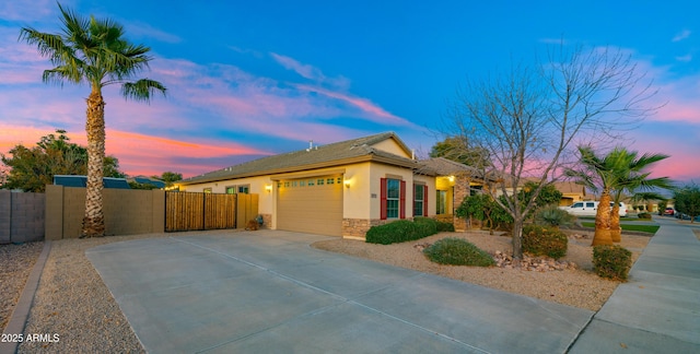 property exterior at dusk featuring a garage