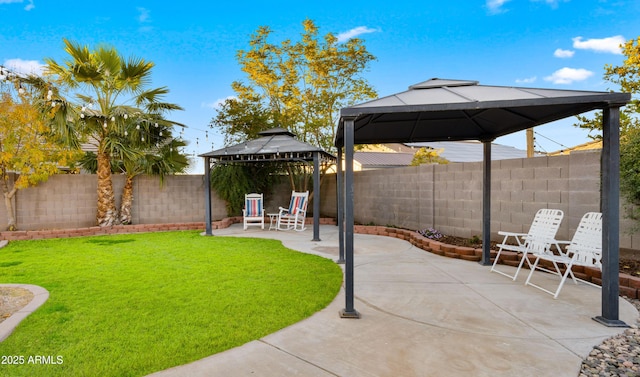 view of yard with a gazebo and a patio