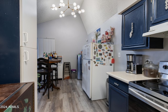 kitchen featuring stainless steel electric range, vaulted ceiling, blue cabinetry, a textured ceiling, and white fridge