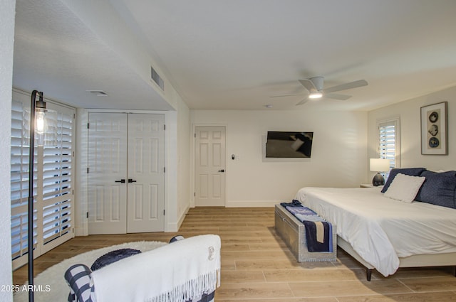 bedroom featuring a closet and ceiling fan