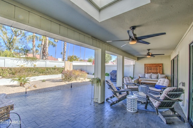 sunroom / solarium with a skylight