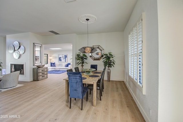 dining room featuring light hardwood / wood-style flooring