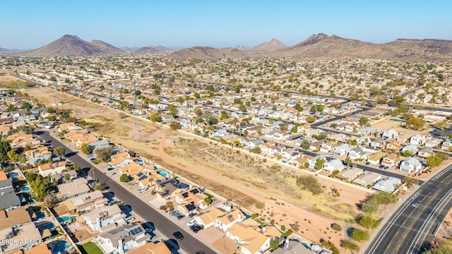 birds eye view of property featuring a mountain view