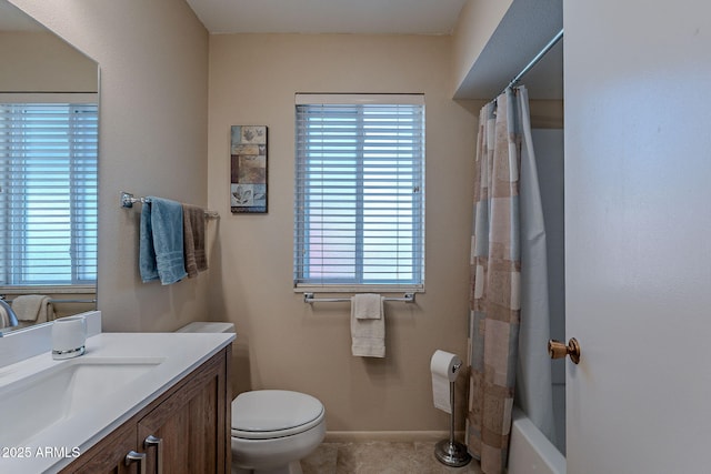 full bathroom featuring vanity, shower / tub combo with curtain, and toilet