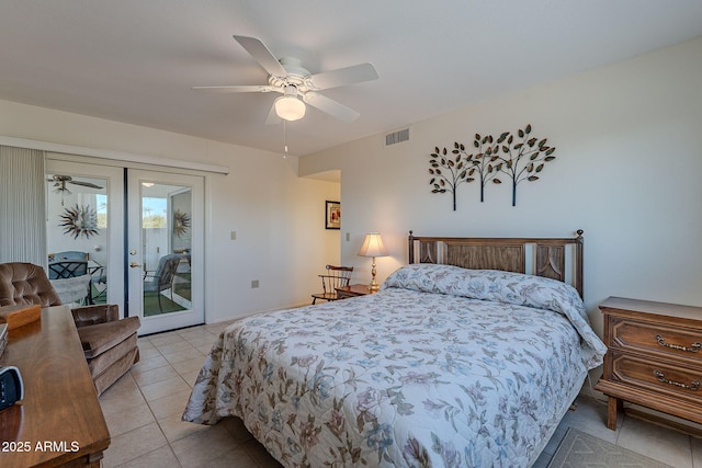 tiled bedroom with french doors, ceiling fan, and access to exterior