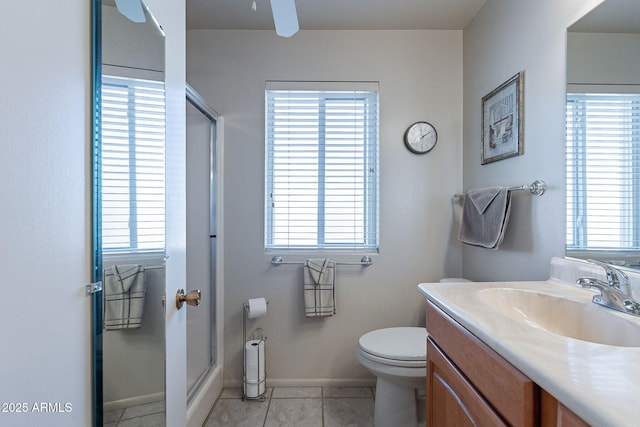 bathroom with an enclosed shower, vanity, tile patterned floors, and toilet