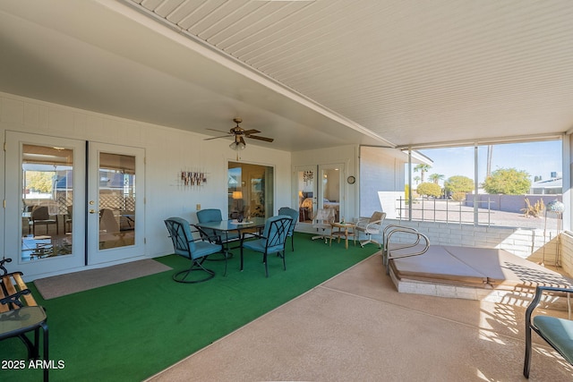 view of patio with french doors and ceiling fan