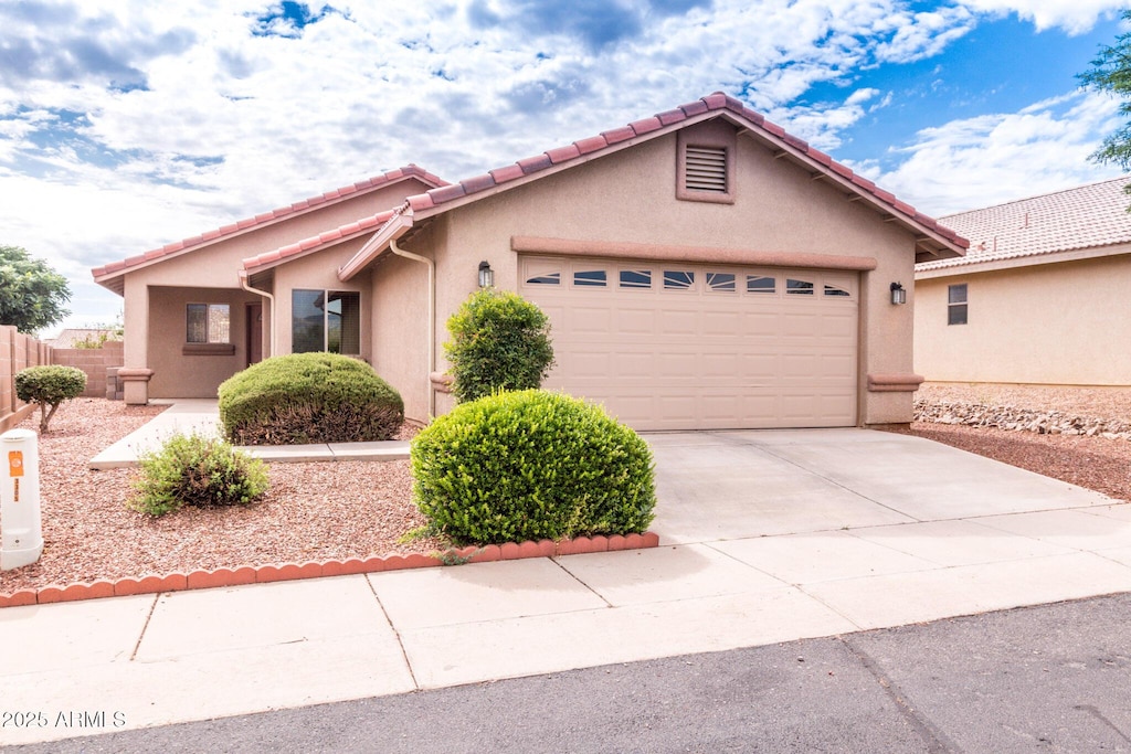 view of front of property featuring a garage