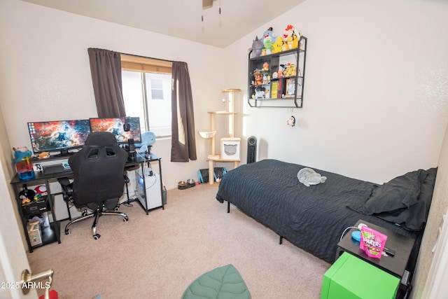 bedroom featuring lofted ceiling and carpet floors