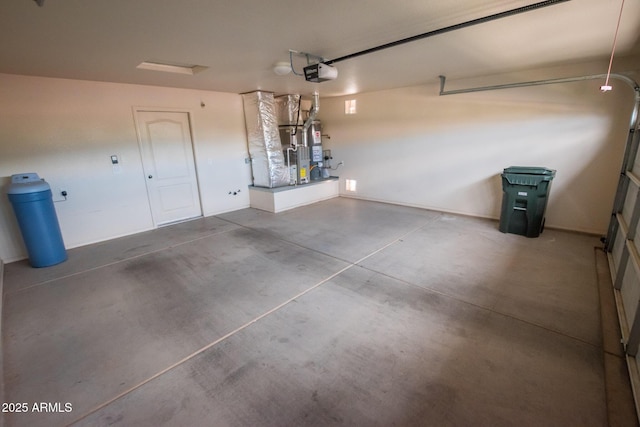 garage with a garage door opener and heating unit