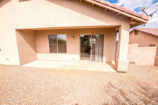 back of house featuring a patio