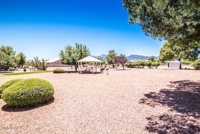 exterior space featuring a mountain view and a gazebo