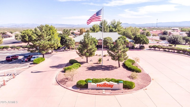 birds eye view of property featuring a mountain view