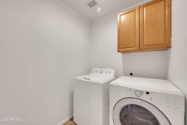 8009 W Salter Dr, Peoria, AZ 85382 - washroom with cabinet space and washing machine and dryer