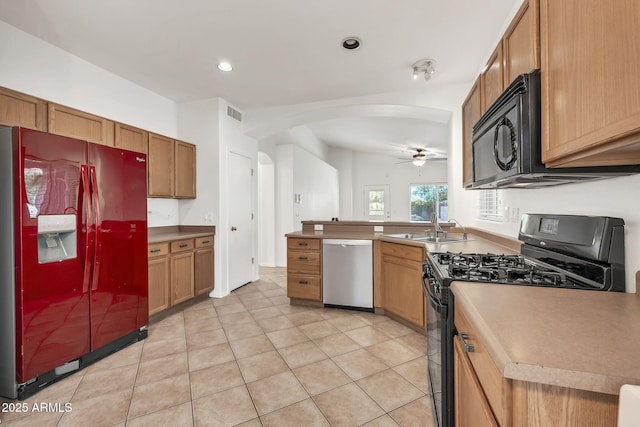 8009 W Salter Dr, Peoria, AZ 85382 - kitchen featuring black appliances, a sink, arched walkways, ceiling fan, and light tile patterned flooring