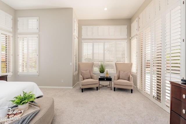bedroom featuring recessed lighting, baseboards, multiple windows, and carpet