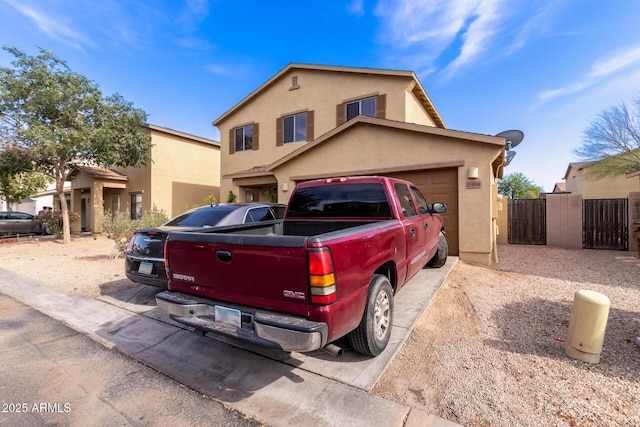 2509 E Meadow Land Dr, San Tan Valley, AZ 85140 - view of front of house featuring stucco siding and a gate